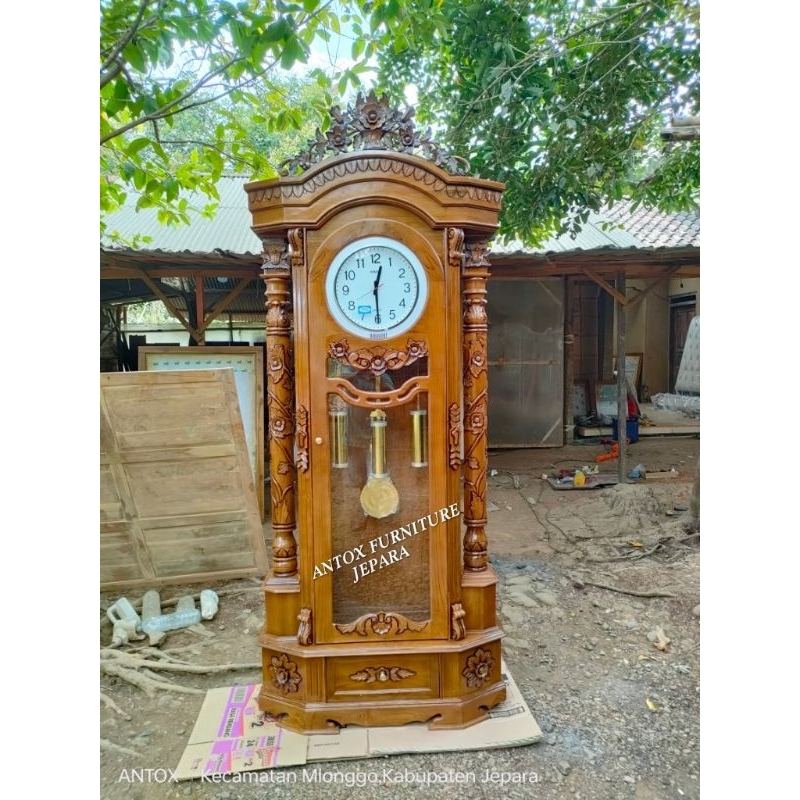 lemari jam ukiran furniture Jepara