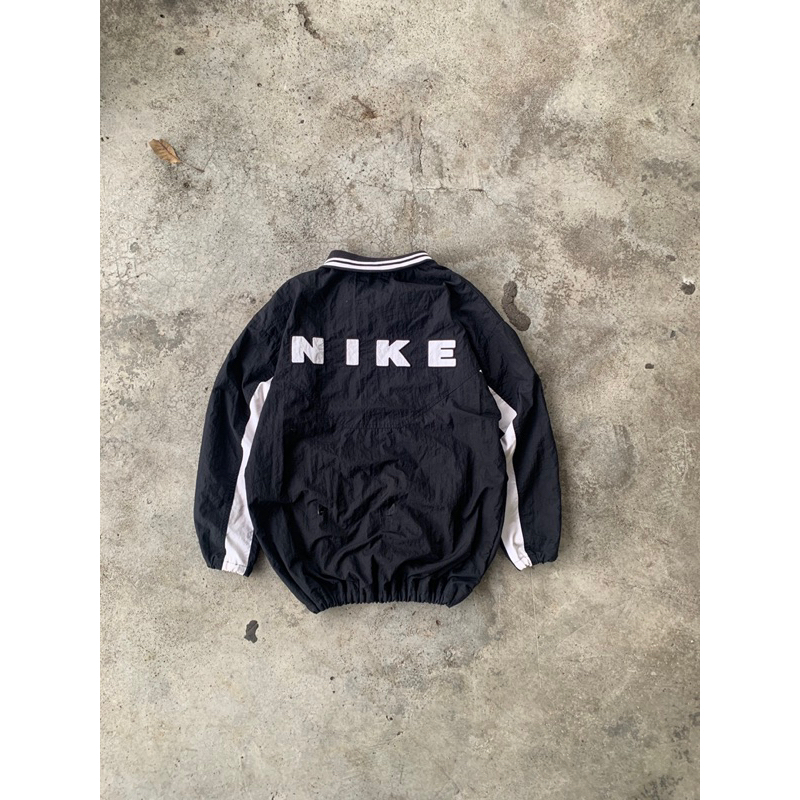 WINDBREAKER NIKE SPELLOUT