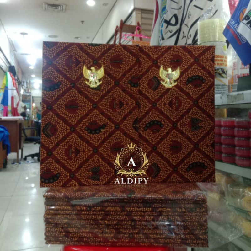 

Map Batik map batik upacara logo garuda kuningan coatingan A4 (22cmx33cm) ready