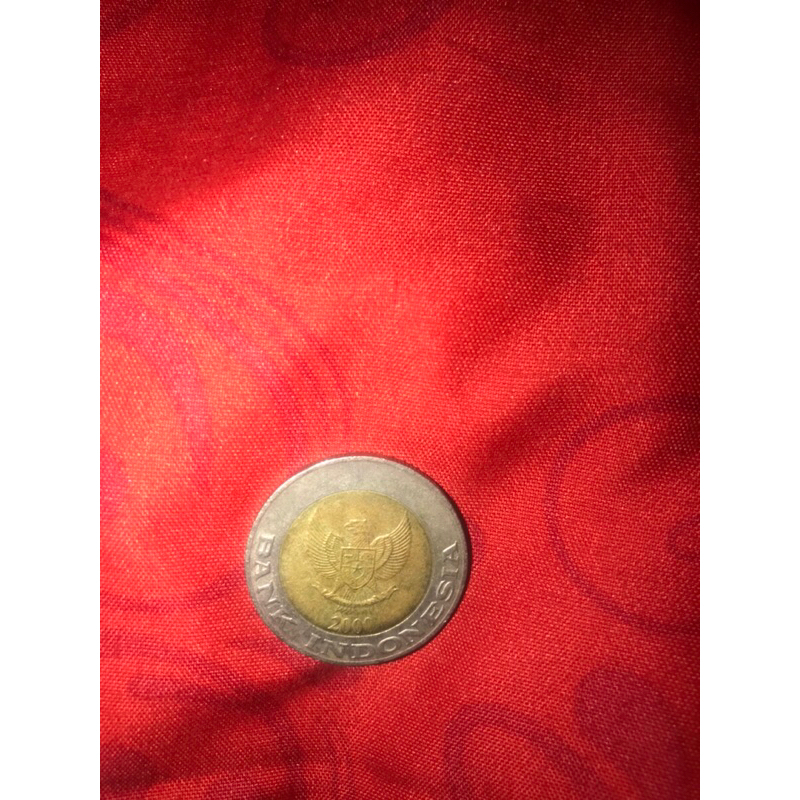 Uang koin 1000 kelapa sawit