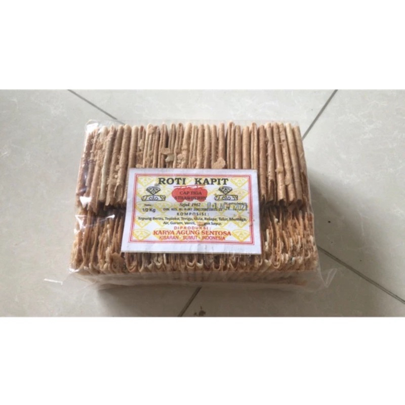 

ROTI KAPIT 500 GRAM / ROTI KIPAS 500 GRAM KUE SEMPRONG LIPAT KUE SEMPRONG KIPAS KAPIT TERMURAH