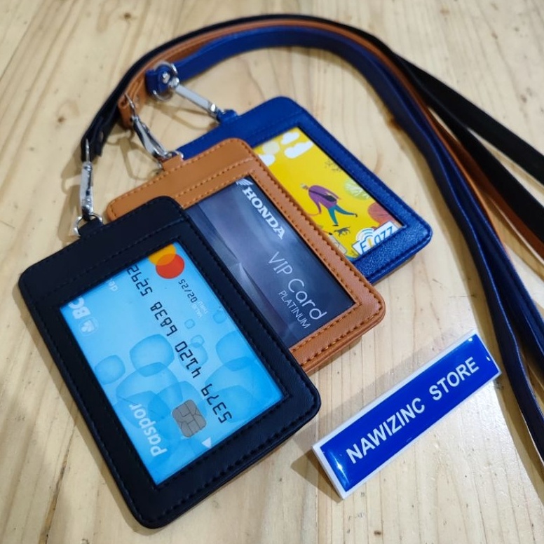 

CODEBARANG659SGI GANTUNGAN ID CARD KULIT SINTETIS 3 SLOT KARTU DENGAN TALI GCN