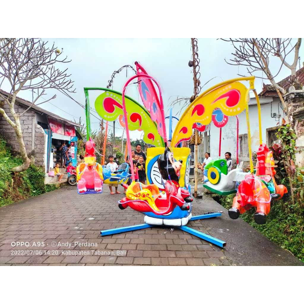 odong-odong komedi putar lantai badut doraemon