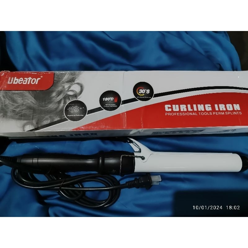 ubeator alat curly rambut