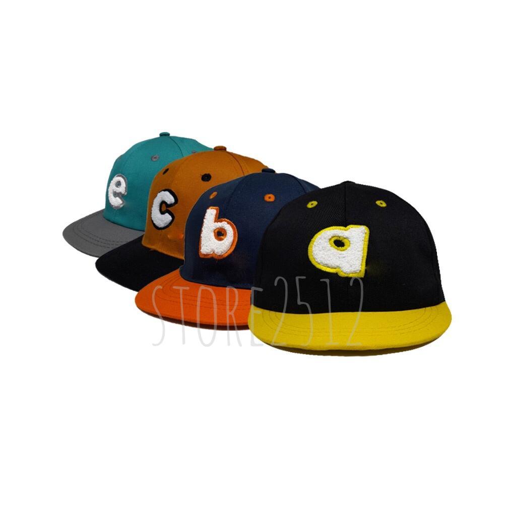 Topi Anak Iniaisal Huruf Bordir Towel Lidah Pendek