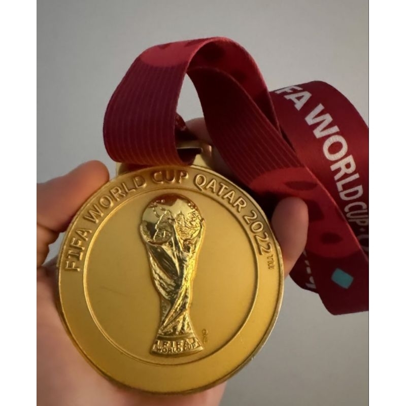 MEDALI JUARA PIALA DUNIA 2022