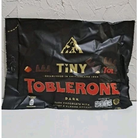 

TOBLERONE TINY SWISS DARK CHOCOLATE WITH HONEY & ALMOND NOUGAT
