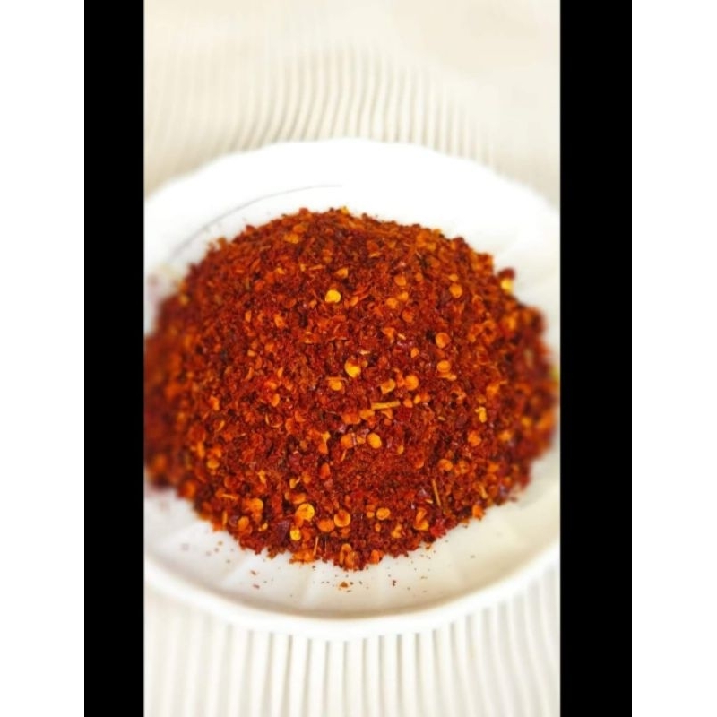 

cabe bubuk kasar dan aroma daun jeruk pedas juara kemasan 100gr