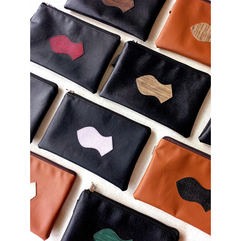 

Pouch Terompah Bahan sintetis