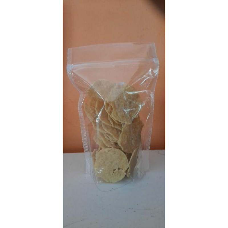 

KERUPUK PULI BERAS GURIH KHAS LUMAJANG TANPA DIJEMUR kemasan 100gram