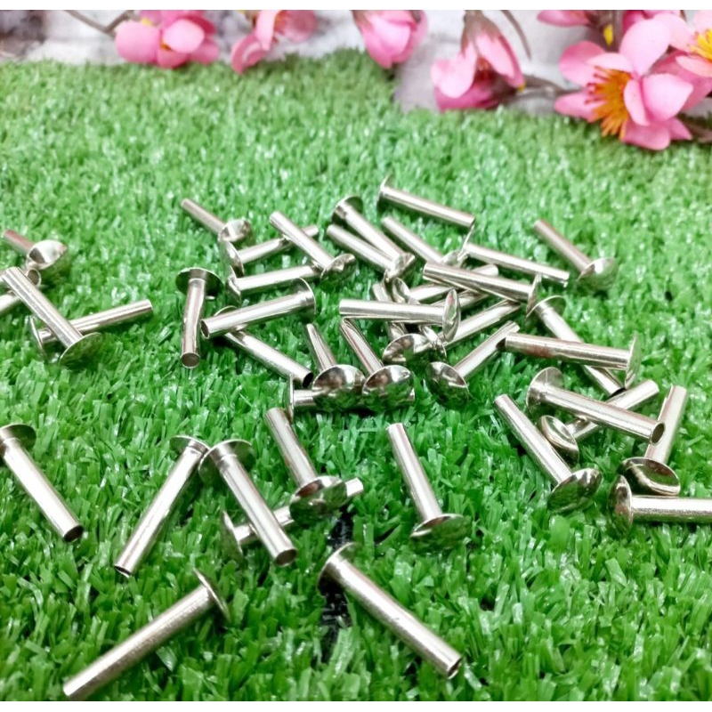 Paku rivet keling untuk pengunci tali helm