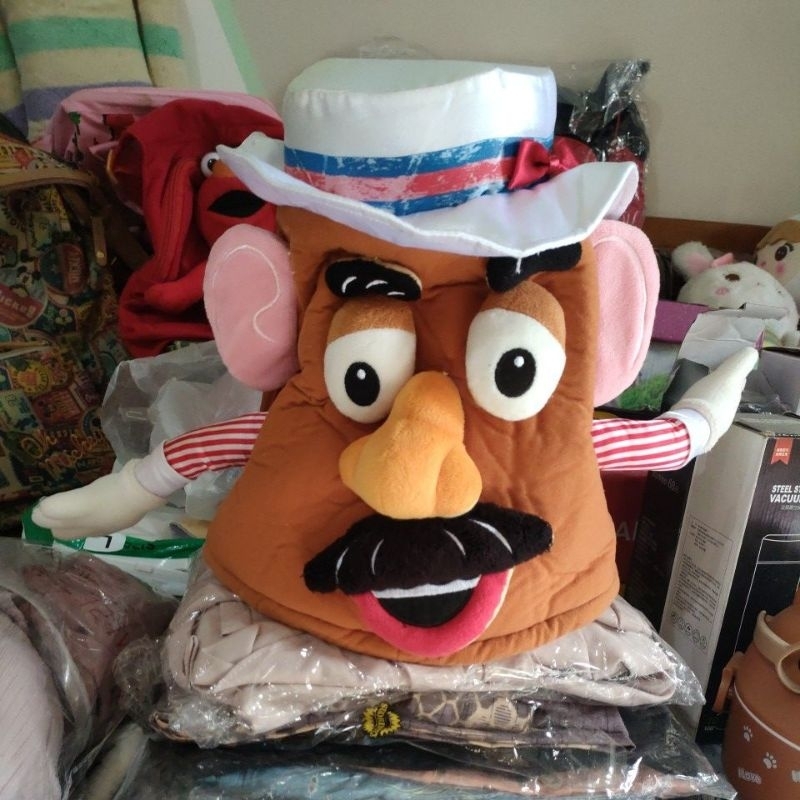 topi boneka karakter
