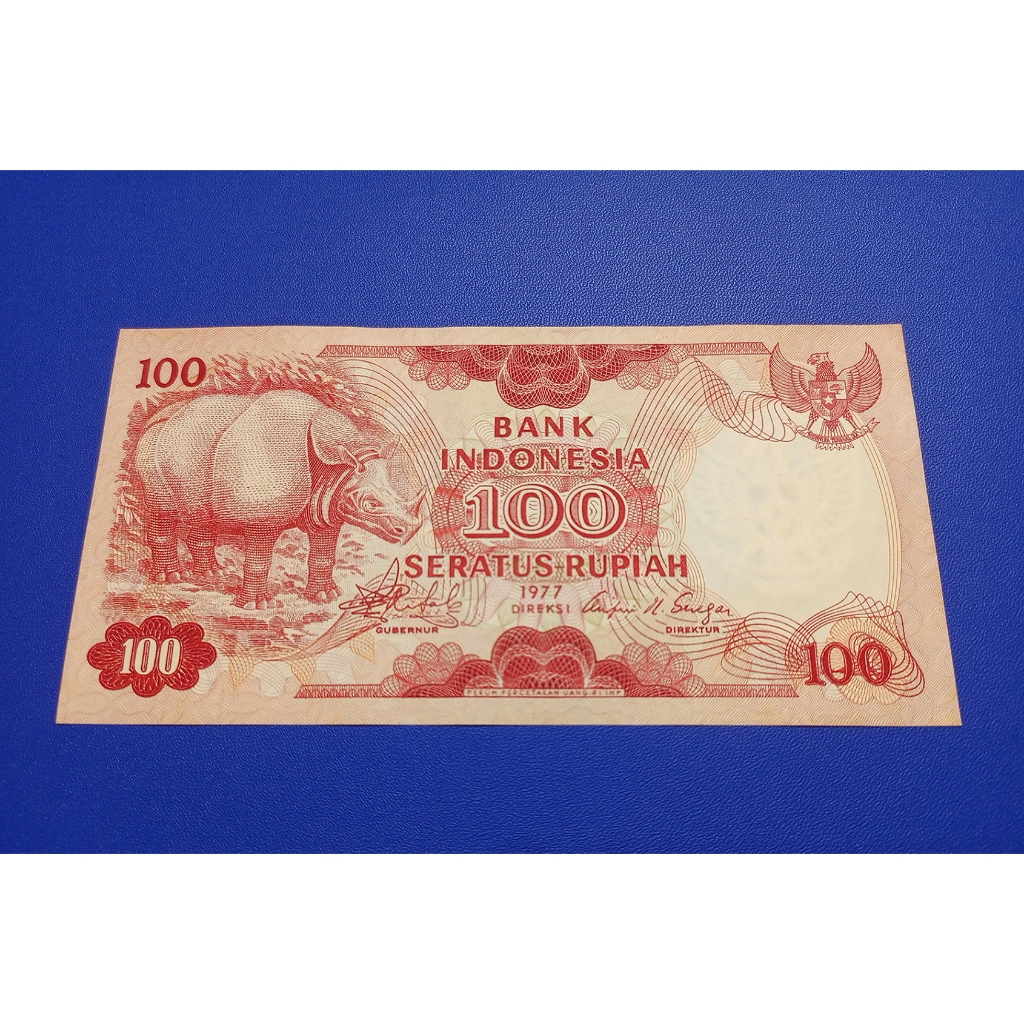 UANG KERTAS JADUL 100 RUPIAH BADAK JAWA