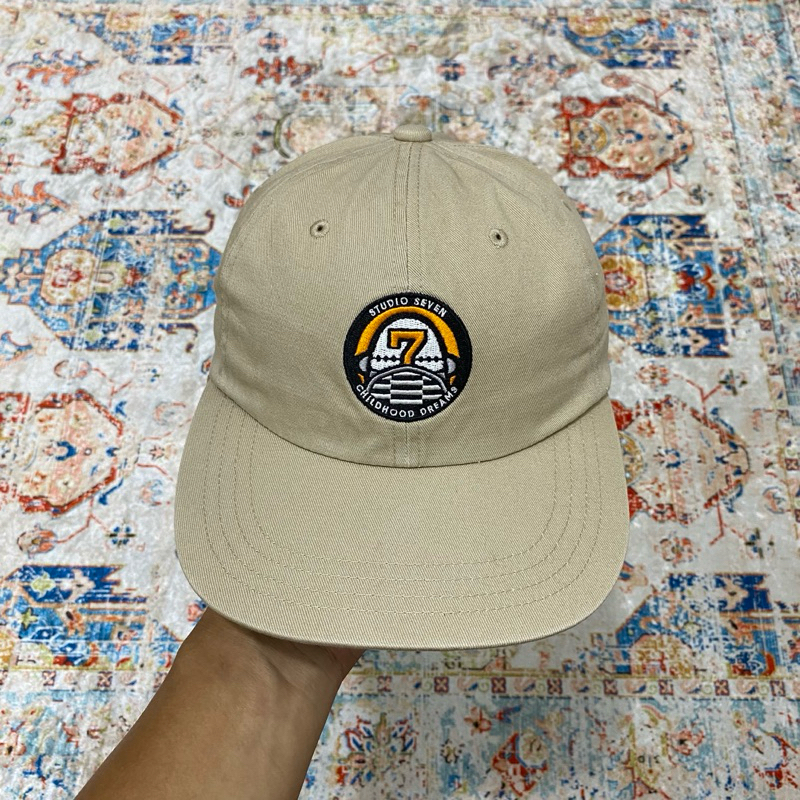 topi studio seven x uniqlo