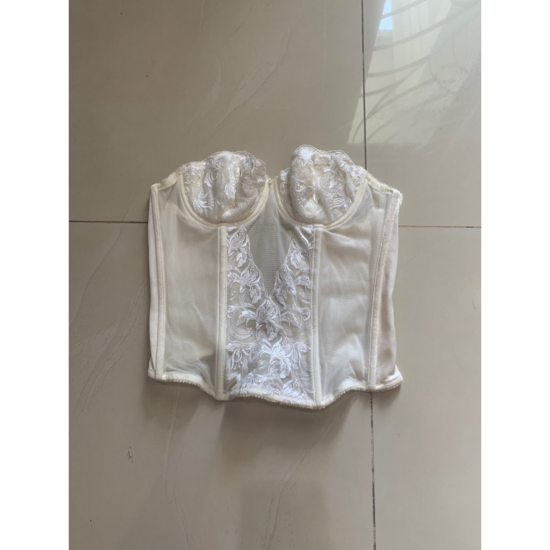 Korset Preloved merk Triumph