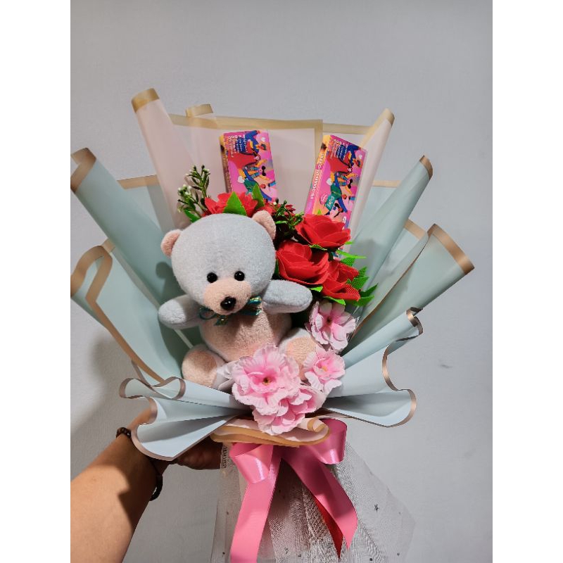 

Bucket snack dan Boneka
