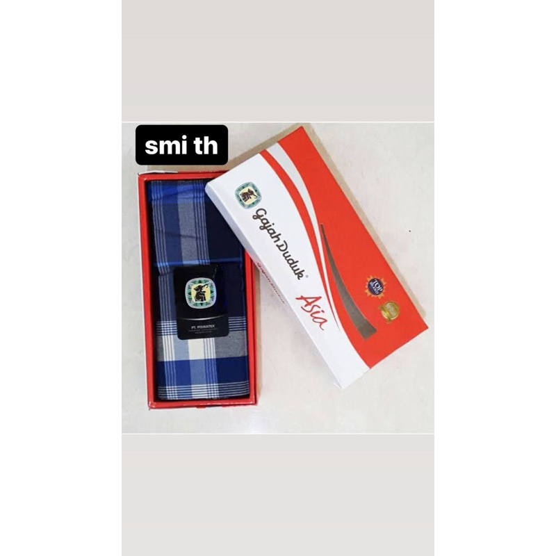 kain sarung gajah duduk