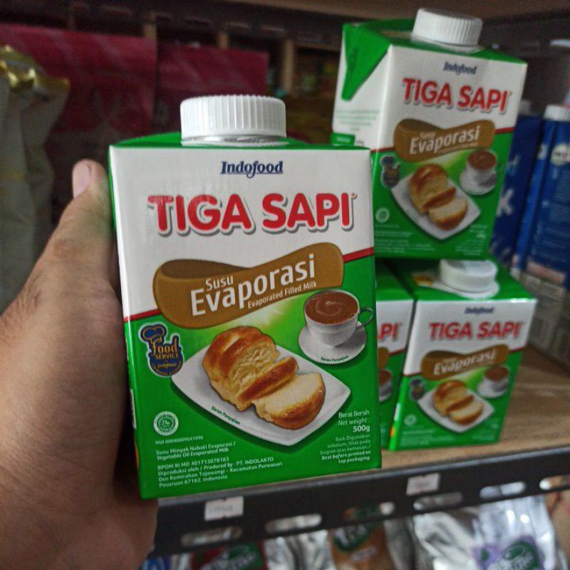 

Susu Evaporasi Tiga sapi 500gr / Evaporated Filled Milk Tigasapi