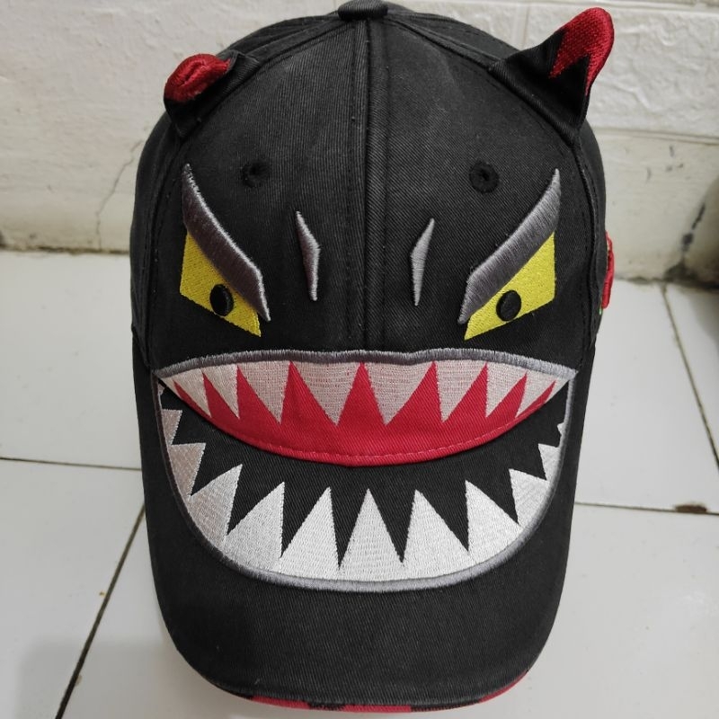 topi elstinko dewasa