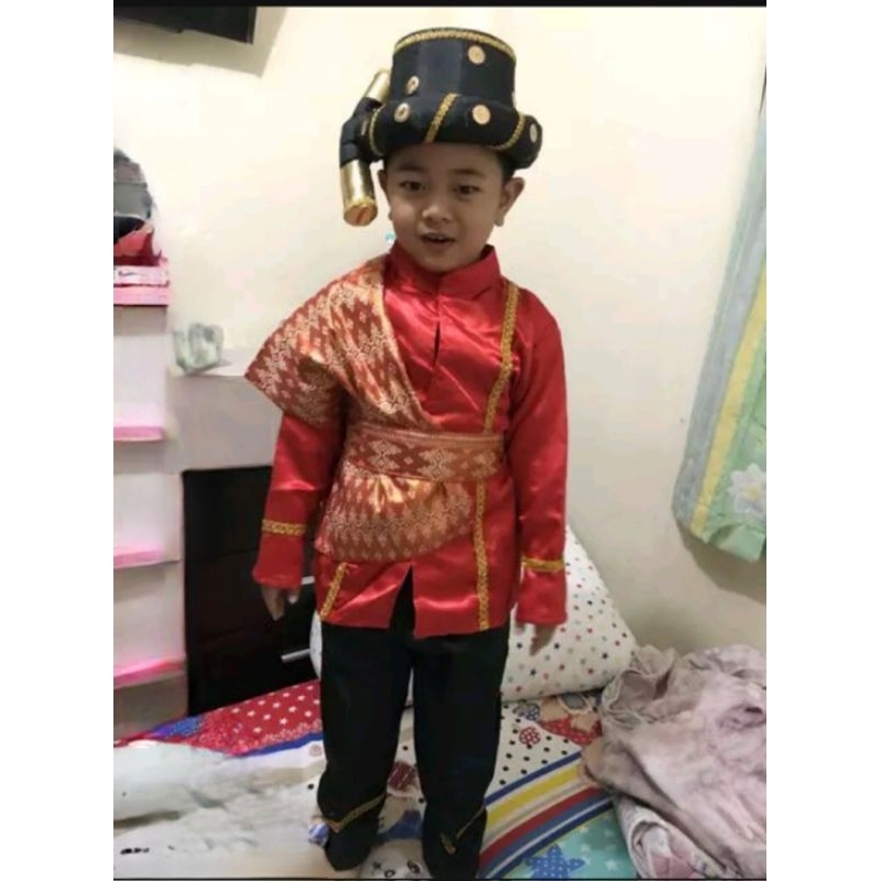 Baju adat batak anak laki