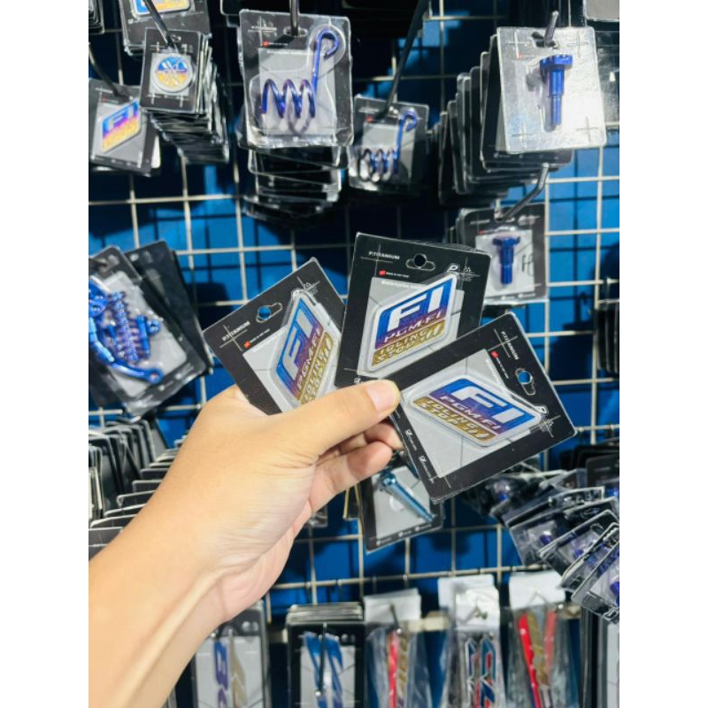 emblem PGM Fi Honda titanium