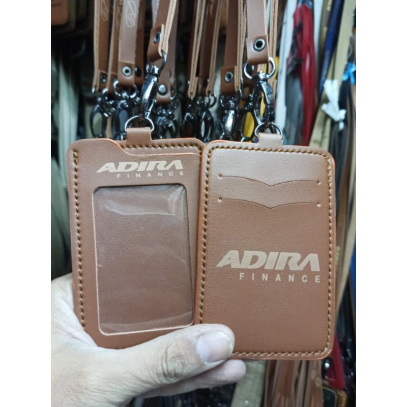 

NAMA TAG HOLDER ADIRA FINANCE