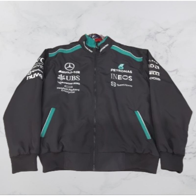 Jaket Mercedes AMG Petro nas F1 Team 2023 - Official Racing Store - Merchandise - ineos - Tommy Hilf