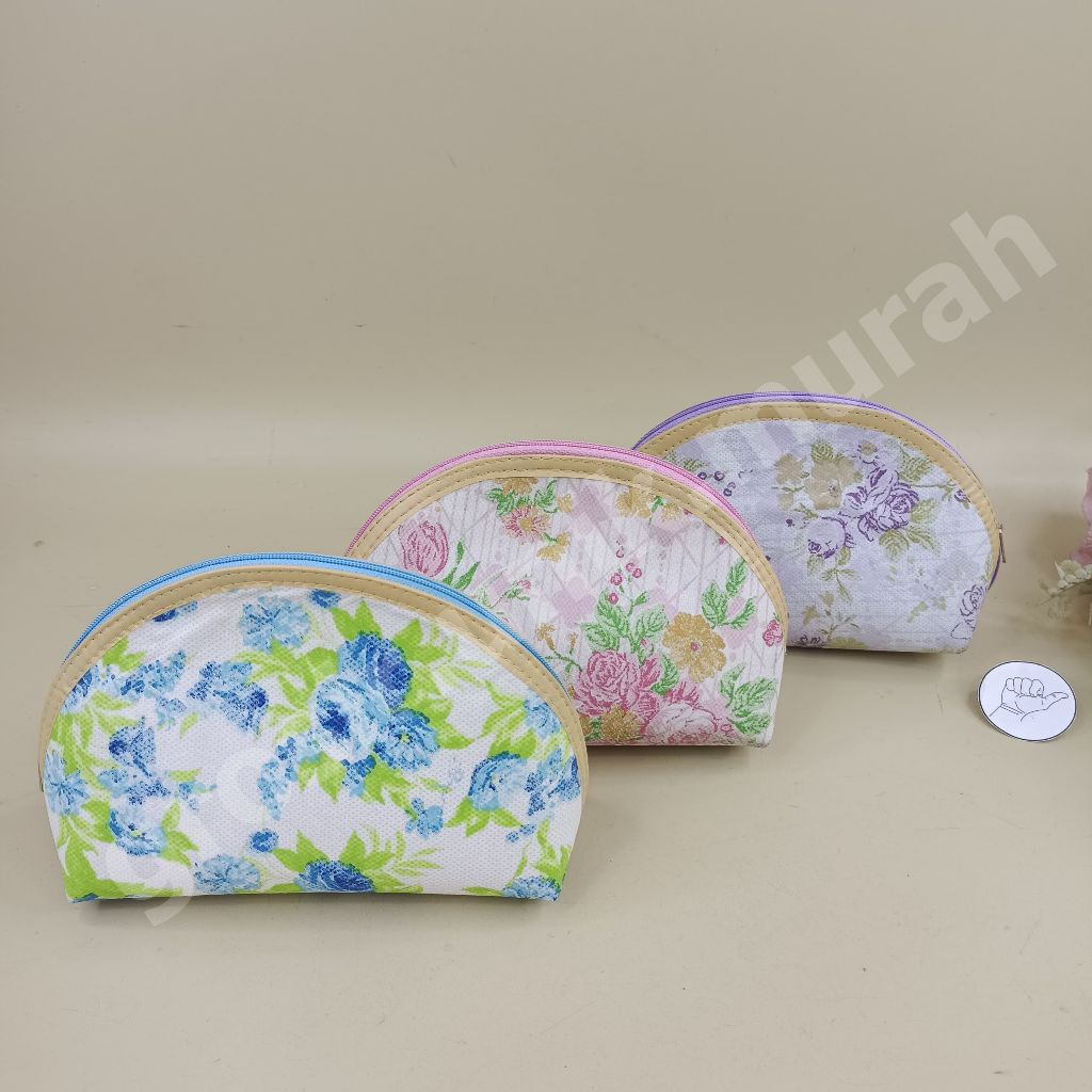 

Dompet Pelok Spunbond Motif 17cm (R-19)