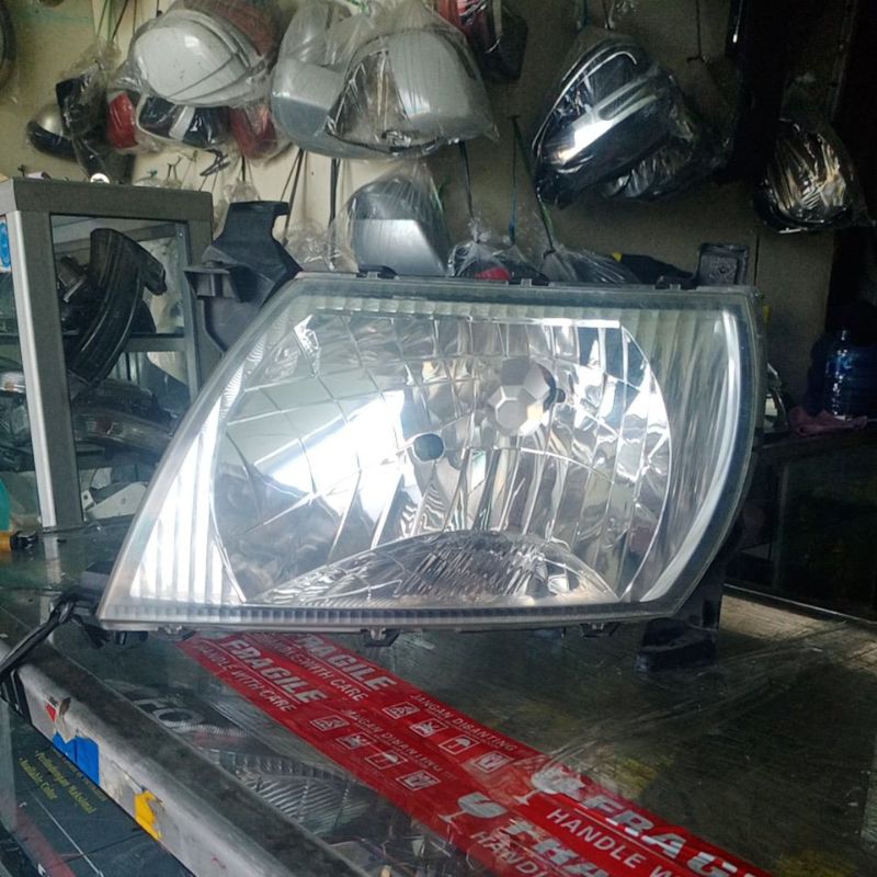 Headlamp / lampu depan kijang lgx tahun 2003-2004 sebelah kiri original
