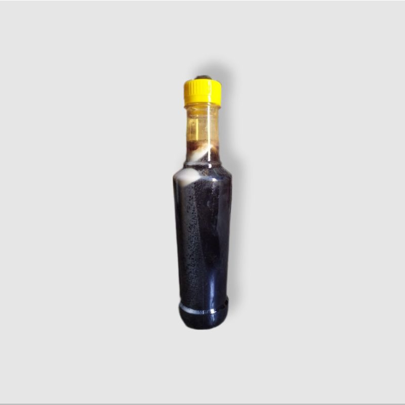

Madu Hitam bunga akasia