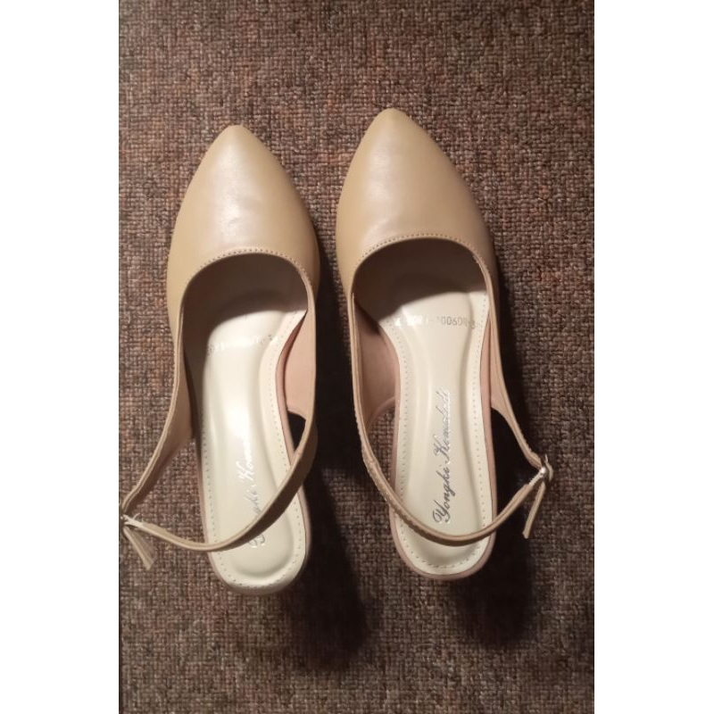 Heels yongki komaladi