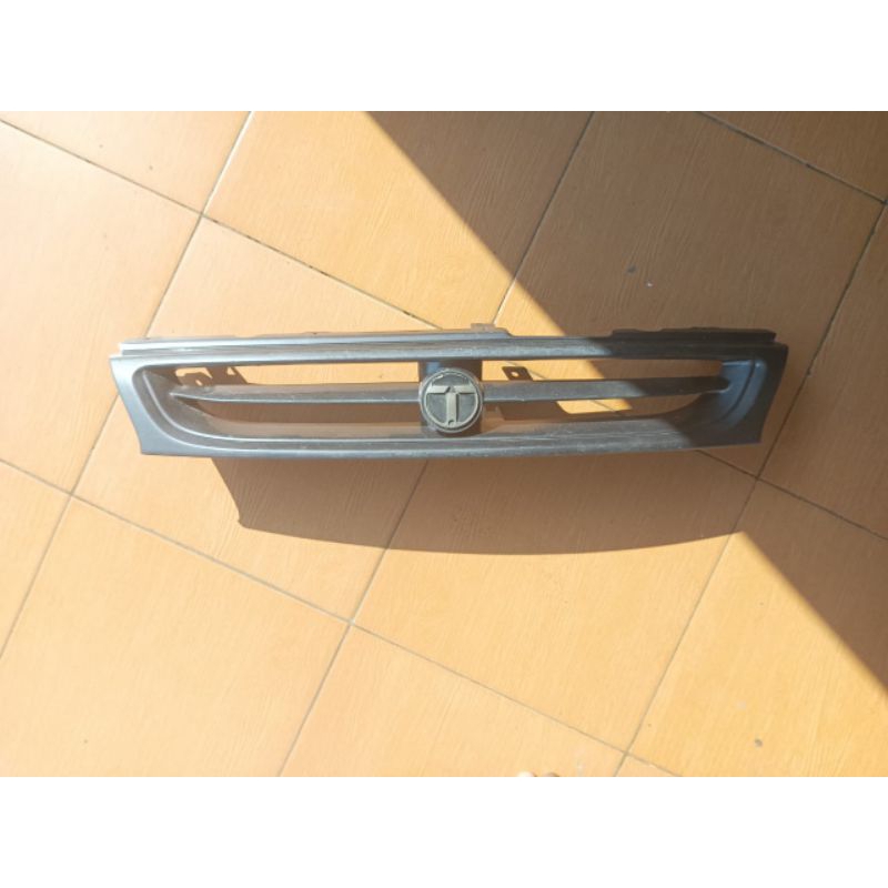 Gril bumper gril bemper depan mobil timor timor original