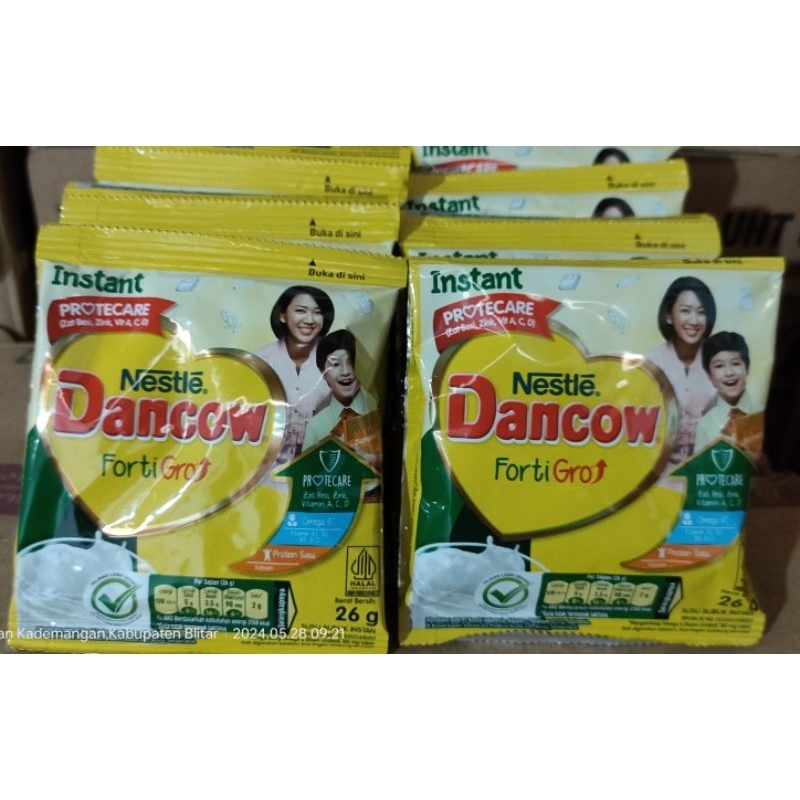 

Dancow FortiGro susu bubuk instan kemasan sachet 26gr (1 renceng isi 10 sch)