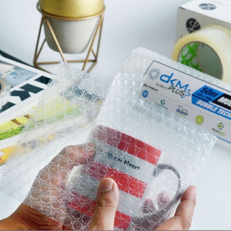 

IK6 PLASTIK BUBBLE WRAP 30X50 DKM+ BENING EKONOMIS BUBLEWRAP PUTIH HITAM RUSFET SUPER TEBAL 30CM X