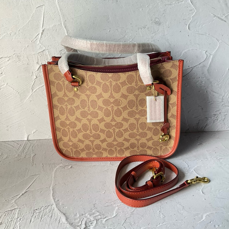 Tyler Carryall In Signature Canvas Tan Rust