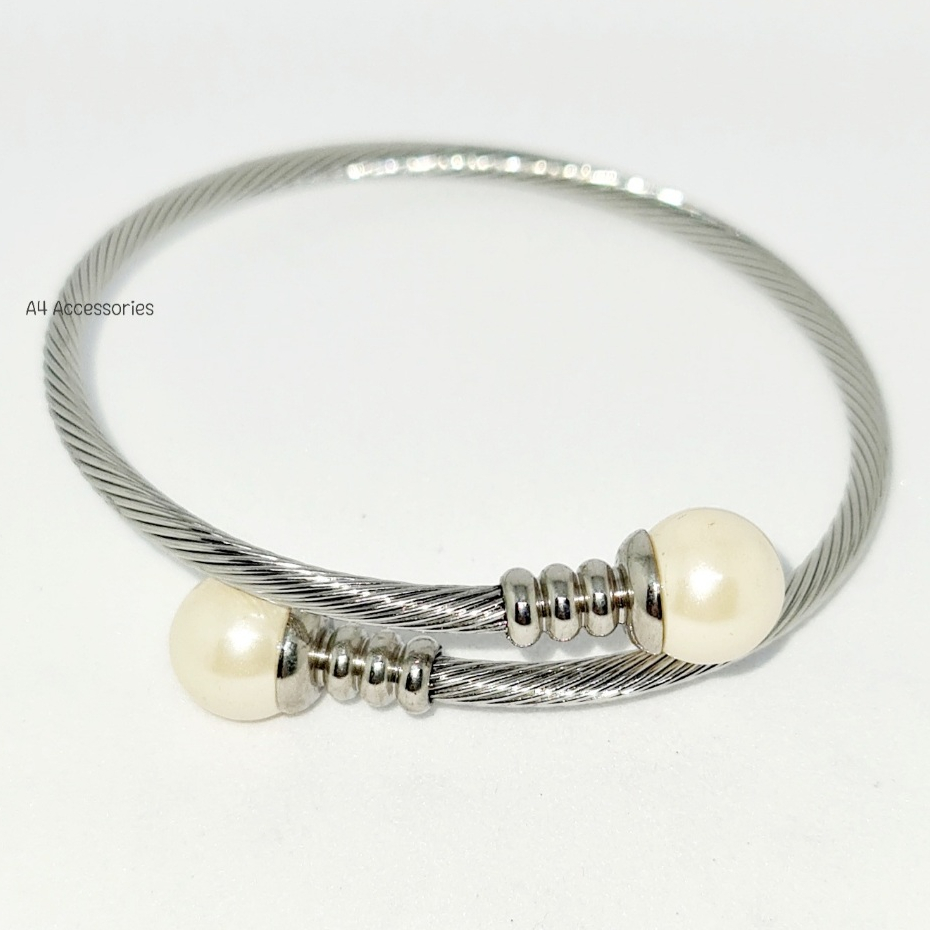 Gelang Tinju Mutiara Titanium