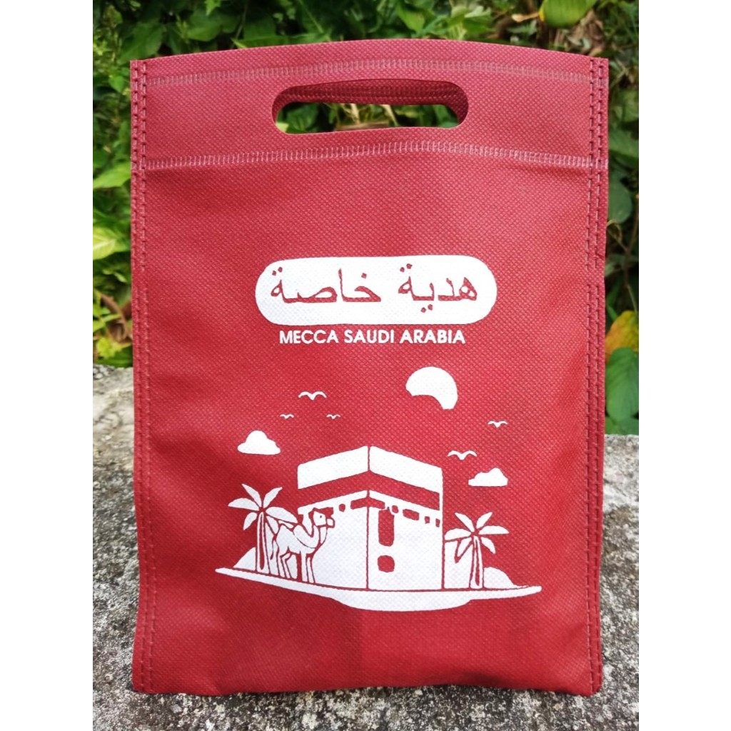 

Tas Oleh Oleh Haji Dan Umroh " Gift From Mecca' / Tas spundbond tebal oleh oleh haji dan umroh