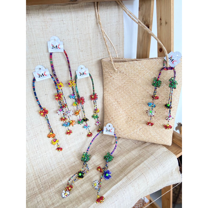 Manika Kaltim - Aksesoris Gantungan Tas Tali Tenun Manik Dayak Kalimantan