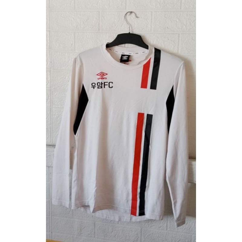Jersey putih merah hitam