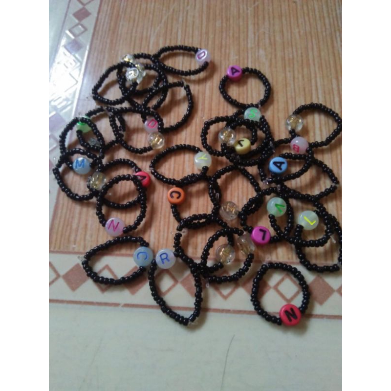 cincin manik manik huruf