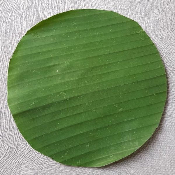 

Daun Pisang BULAT Segar Model Bulat Bungkus Makanan Nasi Jajan Bungkus Kue Nasi Box Acara Syukuran, Selametan-25 DAUN PISANG BULAT