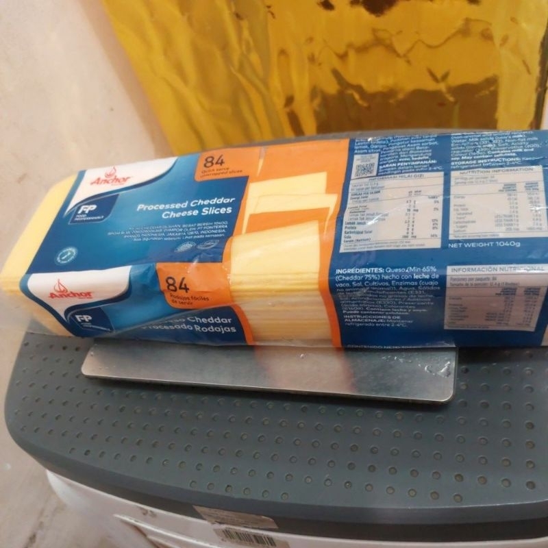 

Anchor Slice Collour cheddar 1kg 84s melted
