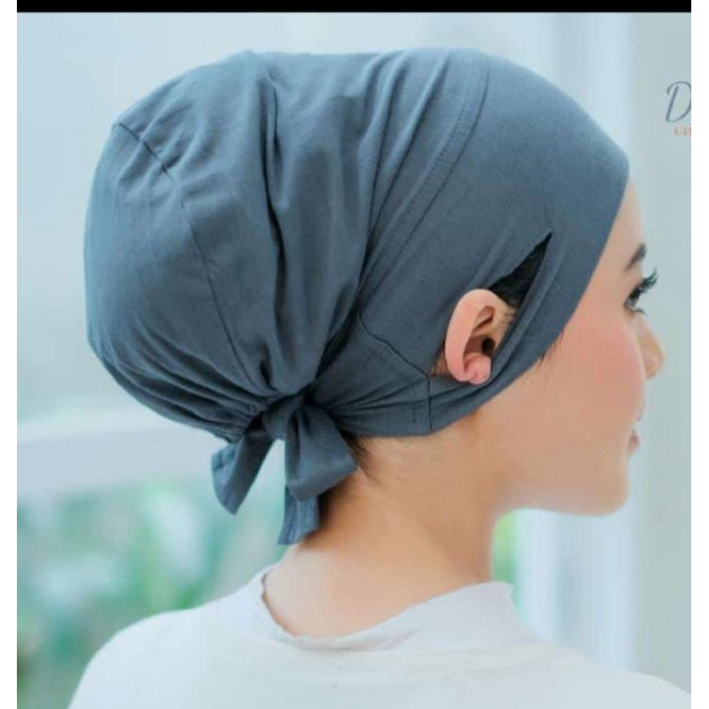 ciput telinga bolong