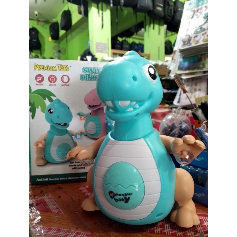 DINOSAURUS MAINAN MUSIK BISA JALAN