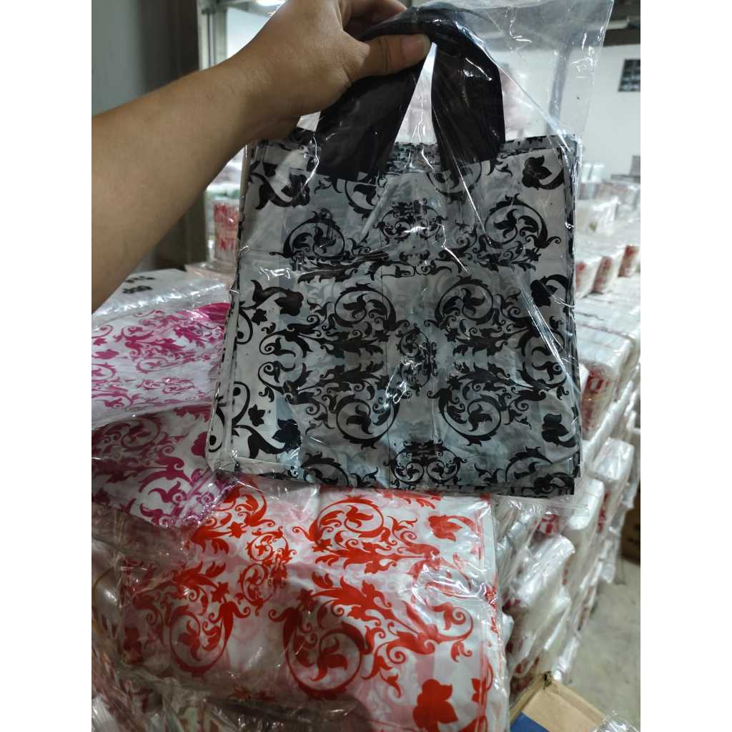 

Plastik Baju/Motif Polkadot 30x32 @50lembar shopping bag/soft handle