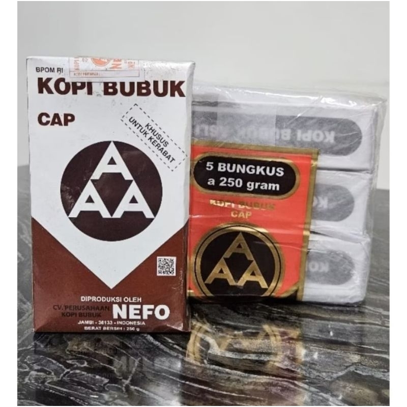 

KOPI BUBUK CAP AAA PRODUKSI ASLI JAMBI PRODUK HALAL BPOM RI MD 868705003010 / BP0M RI MD 868705010010 KEMASAN 1 PACK 250 GR