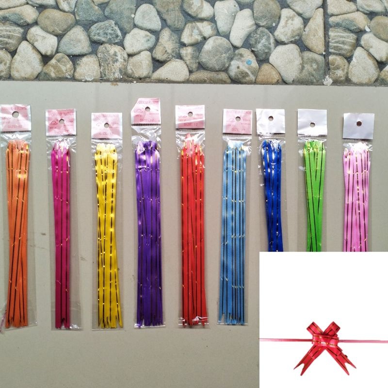 

Pita Tarik / Pita Serut 12mm Lis Gold isi 10pcs