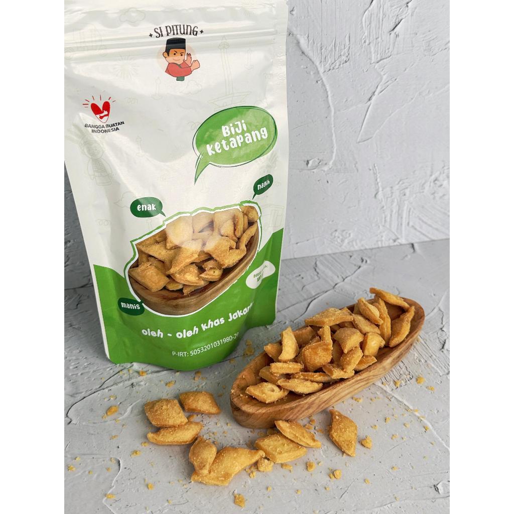 

SNACK BIJI KETAPANG SI PITUNG OLEH OLEH JAKARTA / KUE BIJI KETAPANG MANIS GURIH