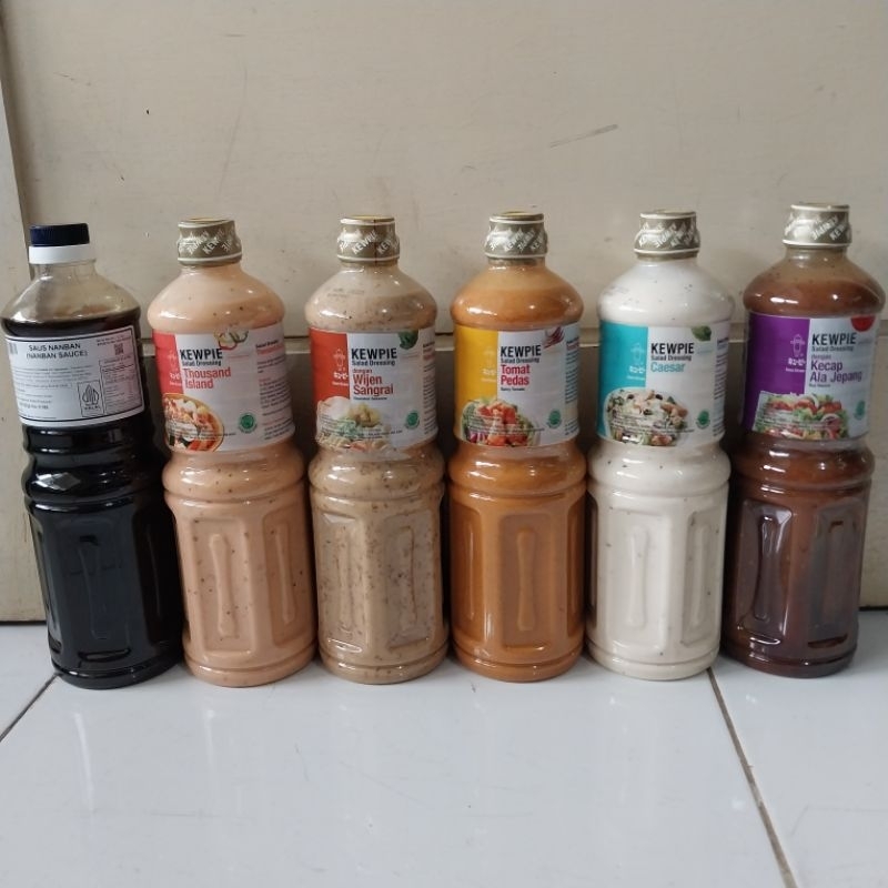 

kewpie 1L salad dressing with wijen sangrai roasted sesame / caesar / spicy tomato / soy sauce / thousand island / bawang bombay cincang / nanban sauce 1.2kg