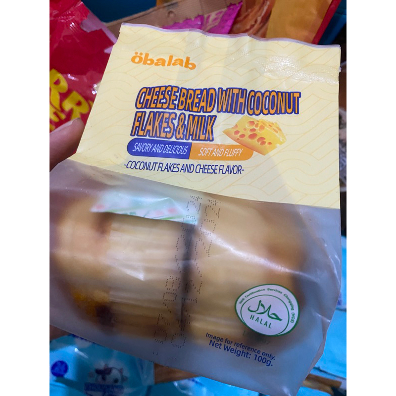 

Obalab cheese bread wih coconut flakes and milk